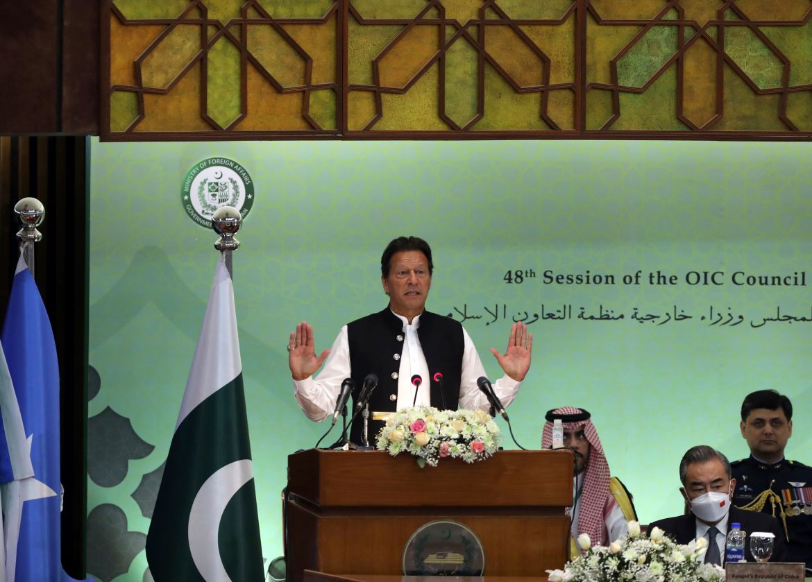 Pakistan's Prime Minister Imran Khan speaks at the start of a two-day gathering of the 57-member Organization of Islamic Cooperation, at the Parliament House in Islamabad, Pakistan, March 22, 2022.