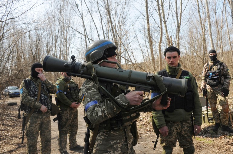  Ukrainian servicemen study a Sweden shoulder-launched weapon system Carl Gustaf M4 during a training session on the near Kharkiv, Ukraine, April 7, 2022. Western weaponry pouring into Ukraine helped blunt Russia's initial offensive and seems certain to play a central role in the approaching battle for Ukraine's contested Donbas region. Yet the Russian military is making little headway halting what has become a historic arms express. 