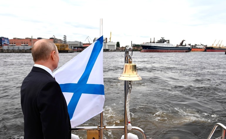 Vladimir Putin attends the launch ceremony for Mekanik Sizov, a super trawler