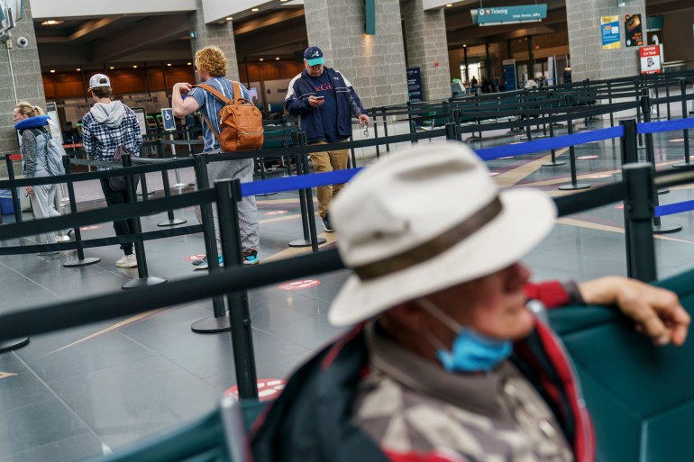 Travellers in a US airport