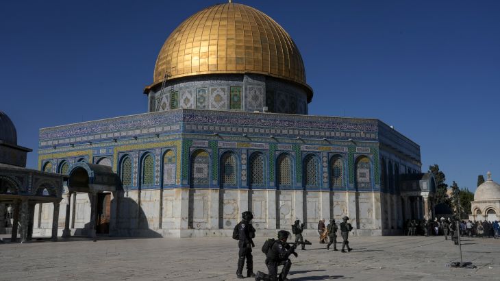 Israeli forces in front of the Dome of Rick shrine at Al-Aqsa Mosque compound.