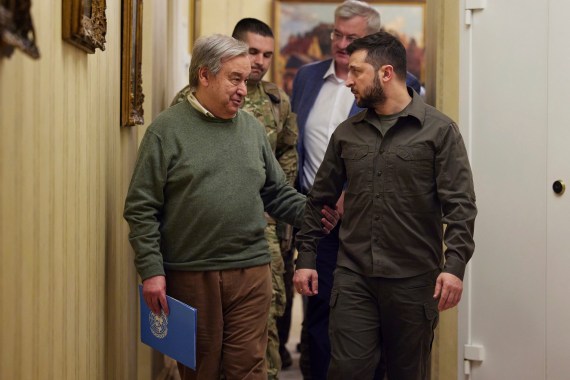 Ukrainian President Volodymyr Zelenskyy, right, and U.N. Secretary-General Antonio Guterres walk along a corridor as they leave a news conference during their meeting in Kyiv,