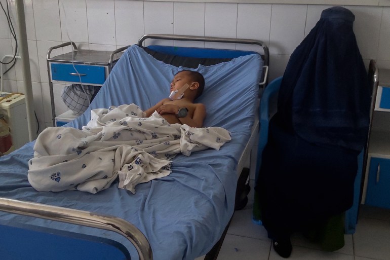A child in hospital receives treatment for injuries sustained in a bomb blast in Kunduz on April 21, 2022 [AFP]