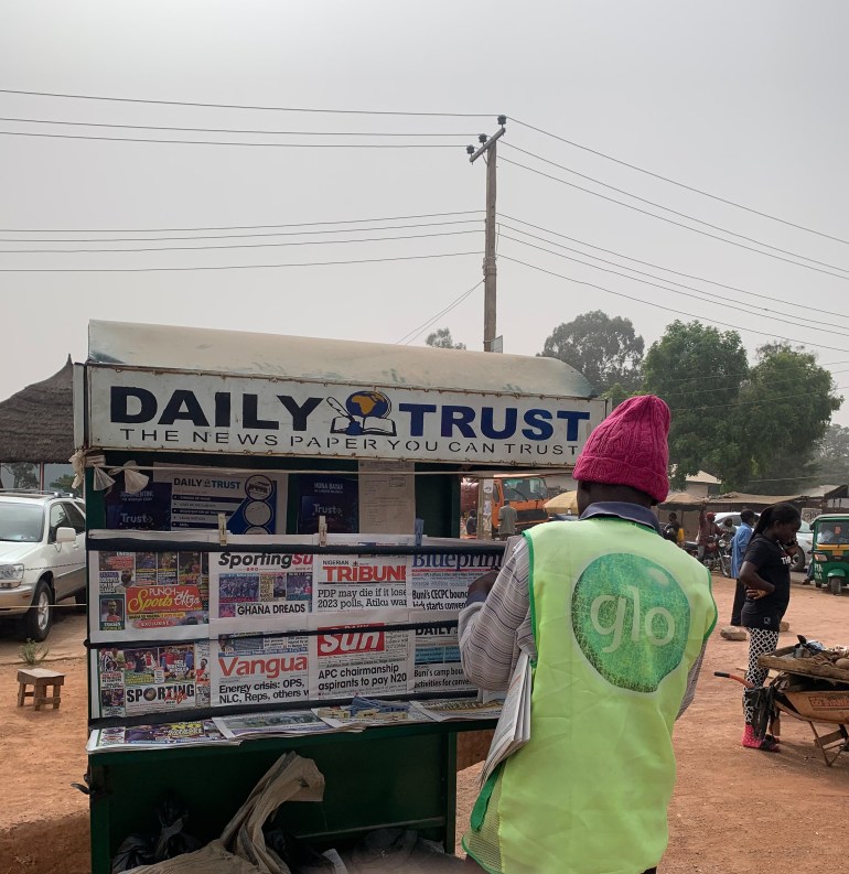 A newspaper vendor in Nigeria