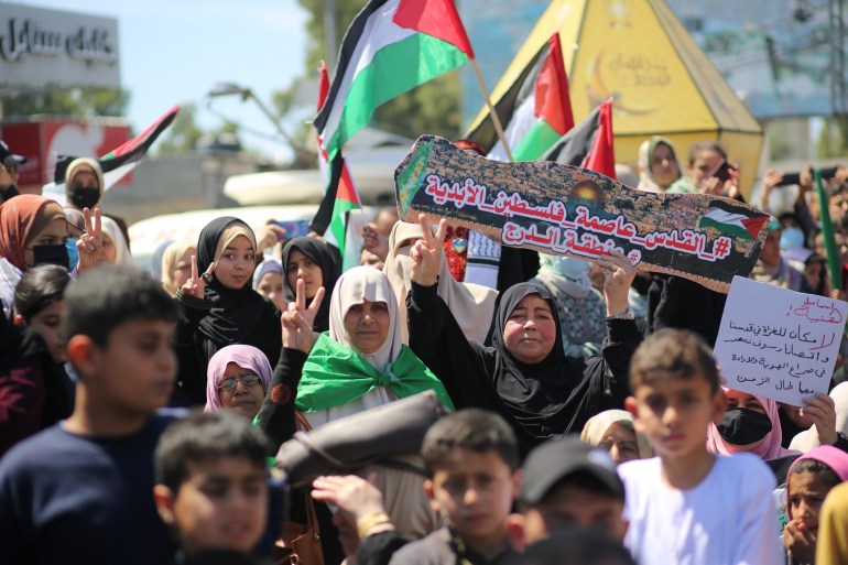 Palestinian women take part in a protest in Gaza