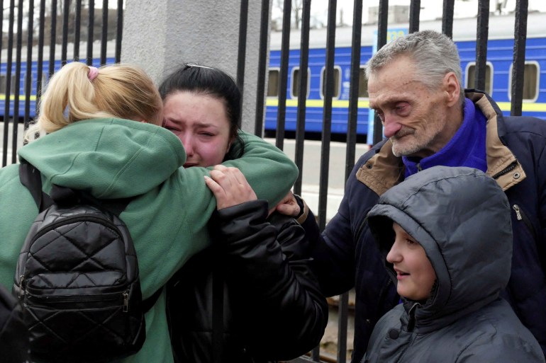 People react as they arrive from Mykolayiv due to daily shelling, amid Russia's invasion of Ukraine, in Odesa, Ukraine