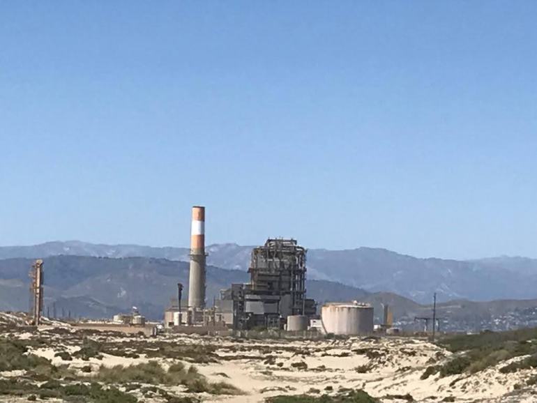 A power plant mars the California coast in Oxnard.