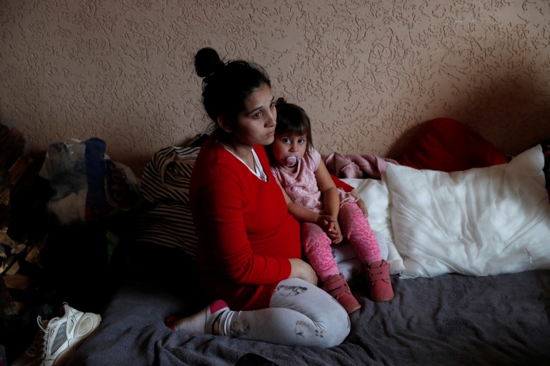 A mother and daughter who fled Russia's invasion of Ukraine at a local resident's home, in Tiszabecs, Hungary.