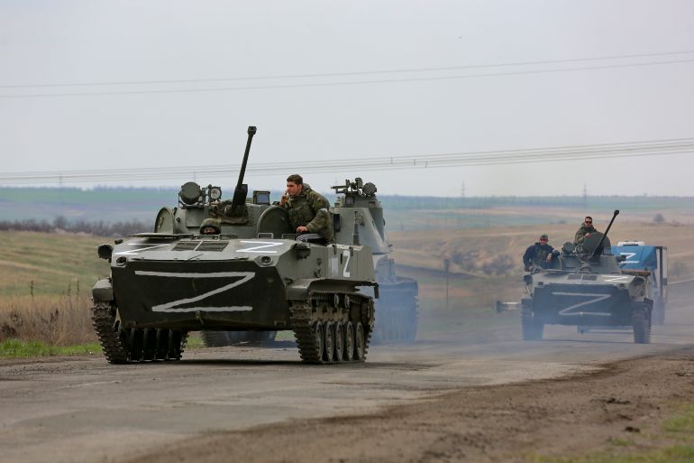 Russian military vehicles on highway in an area controlled by Russian-backed separatist forces near Mariupol.