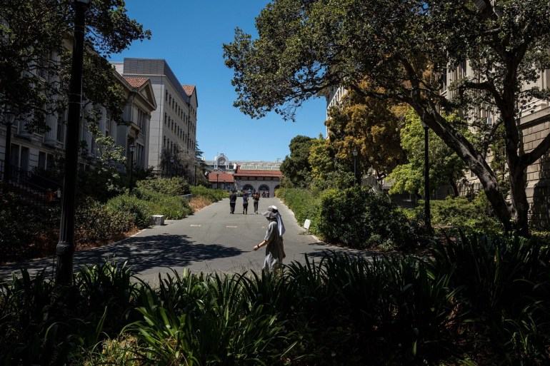 People walk on the University of California, Berkeley campus in Berkeley, California, U.S.