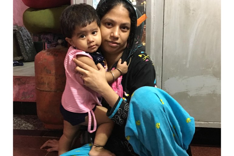 Waste-picker Farzana with her daughter
