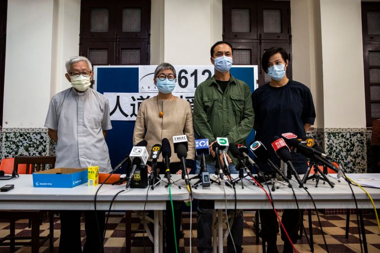Cardinal Joseph Zen, barrister Margaret Ng, professor Hui Po-keung and singer Denise Ho attend a press conference at Salesian Missionary House in Hong Kong.