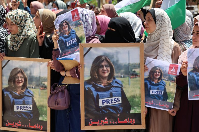 Palestinians take part in a demonstration following the killing of veteran Al-Jazeera journalist Shireen Abu Akleh in Gaza City on May 12, 2022.