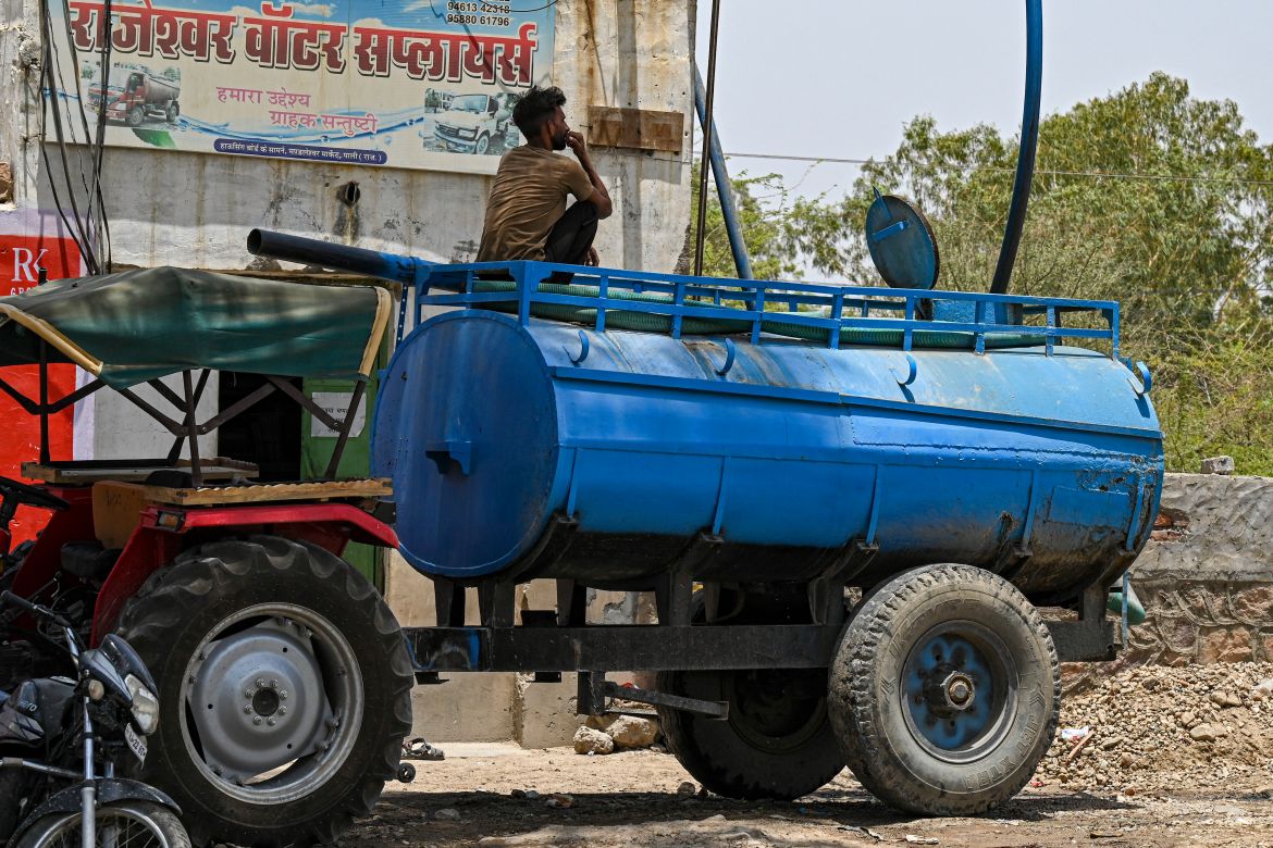 A tanker being refilled with water to supply for the usage by the people on a hot summer day in Pali