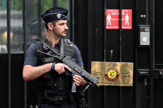 A French UMIP policeman takes up a position outside the Qatar Embassy in Paris