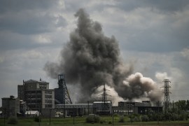Smoke and dirt ascend after an attack at a factory in the city of Soledar, in Ukraine&#39;s eastern Donbas region, May 24, 2022 [File: Aris Messinis/AFP]