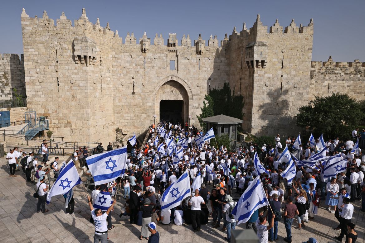 Demonstrators gather with Israeli flags at the Damascus Gate