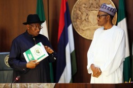 Former Nigerian President Goodluck Jonathan (L) could be a surprise selection to replace President Mohammadu Buhari who succeeded him in 2015