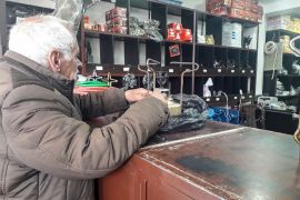 Abu Mohamed, a Syrian in Homs, returns to the store to fix his recently-purchased kerosene-lit stove which broke down from heavy usage