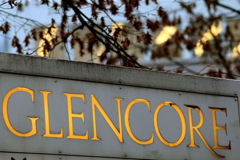 The logo of commodities trader Glencore is pictured in front of the company's headquarters in Baar, Switzerland
