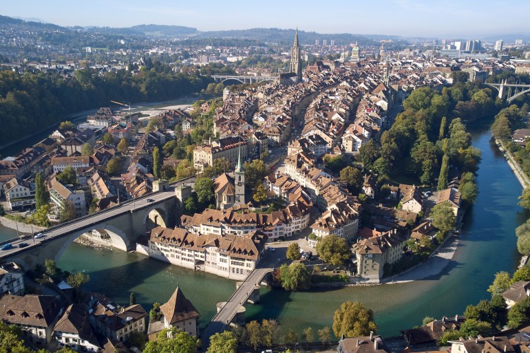 The old town of Bern and the Aare river are pictured in early autumn light in Bern, Switzerland