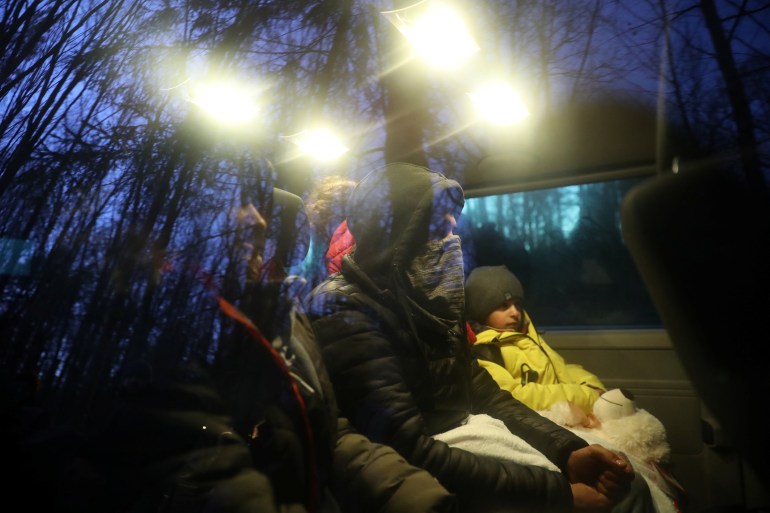 Migrants taken to a Polish detention centre