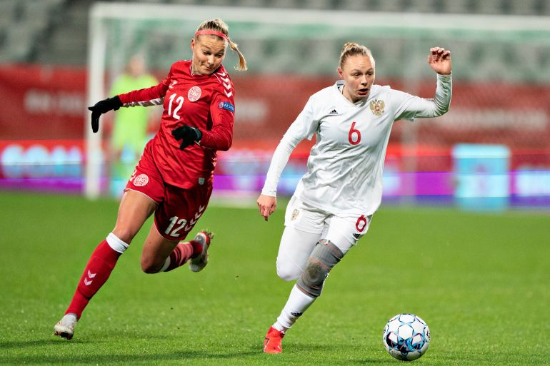Denmark's Stine Larsen in action with Russia's Alena Andreeva Henning Bagger