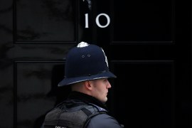 A police officer stands on duty outside 10 Downing Street in London, the UK.