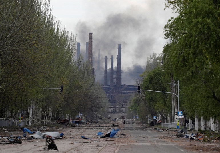 Smoke rises above a plant of Azovstal Iron and Steel Works during Ukraine-Russia conflict in the southern port city of Mariupol.