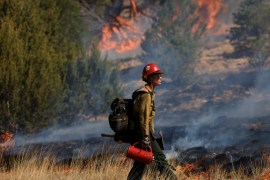 Beyond the threat to lives, livelihoods, and property, the expanding danger zone threatens to put further risk on firefighters [File: Kevin Mohatt/Reuters]