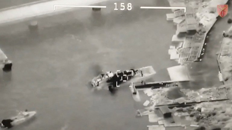 An aerial view shows Ukrainian UAV Bayraktar targeting Russian landing craft vessel at Zmiinyi (Snake) Island, Ukraine