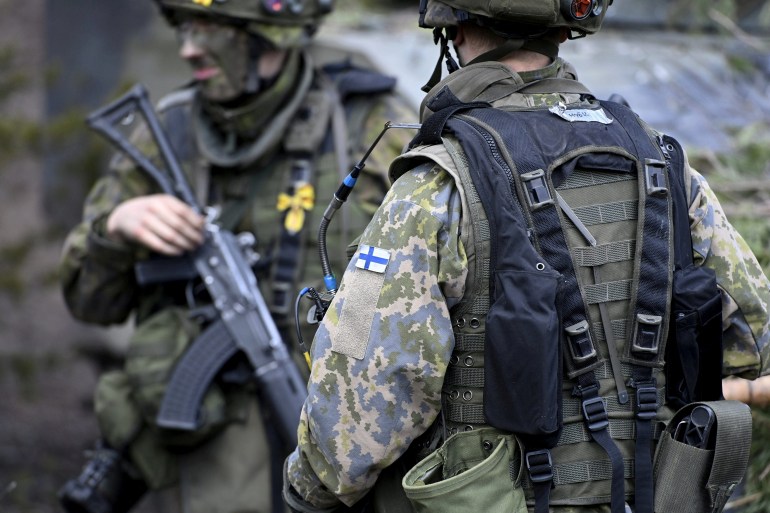 Two Finnish soldiers during military drills in May