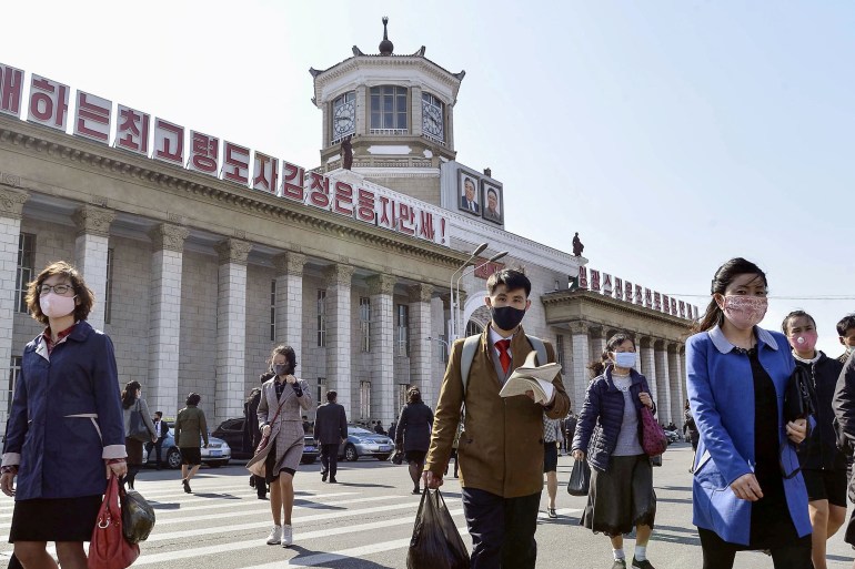 People in masks in Pyongyang