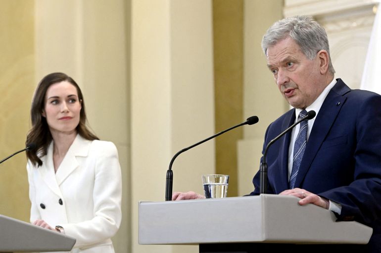 Finland's Prime Minister Sanna Marin and Finland's President Sauli Niinisto attend a joint news conference on Finland's security policy decisions at the Presidential Palace in Helsinki, Finland, May 15, 2022.