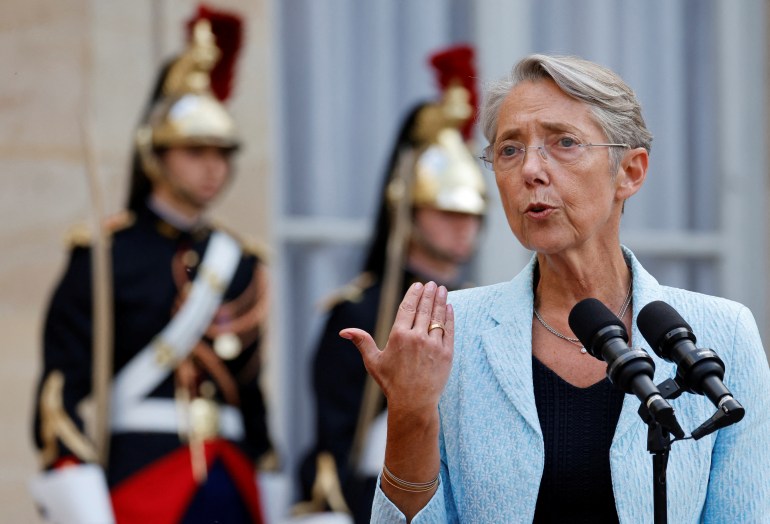France's newly appointed Prime Minister Elisabeth Borne delivers a speech during a handover ceremony in the courtyard of the Hotel Matignon, French prime minister's official residence, in Paris