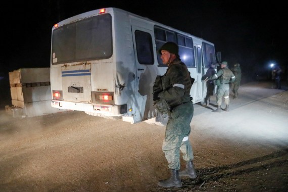 A bus carrying Ukrainian forces from Mariupol