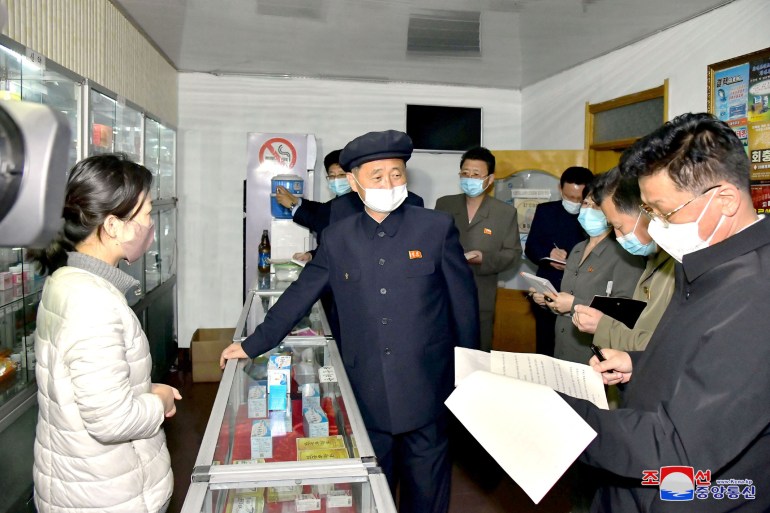 North Korea's Premier Kim Tok Hun, inspects a pharmacy amid COVID-19 pandemic, in Pyongyang,