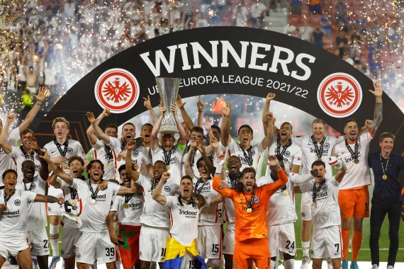 Eintracht Frankfurt's Sebastian Rode lifts the trophy as he celebrates with teammates after winning the Europa League