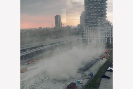 A dust cloud swirls in Toronto on Saturday in this screengrab obtained from a social media video [Dr Liza Egbogah via Reuters]