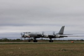 Russian Tu-95 strategic bomber takes off during Russian-Chinese military aerial exercises to patrol the Asia-Pacific region, at an unidentified location, in this still image taken from a video released on May 24, 2022 [Russian Defence Ministry/Handout via Reuters]