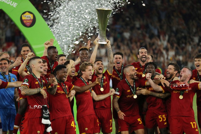 AS Roma's Lorenzo Pellegrini lifts the Europa Conference League trophy