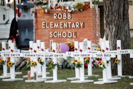 crosses are seen outside robb elementary school in uvalde, texas