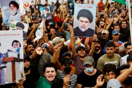 Supporters of Iraqi Shia cleric Muqtada al-Sadr shout slogans during a celebration