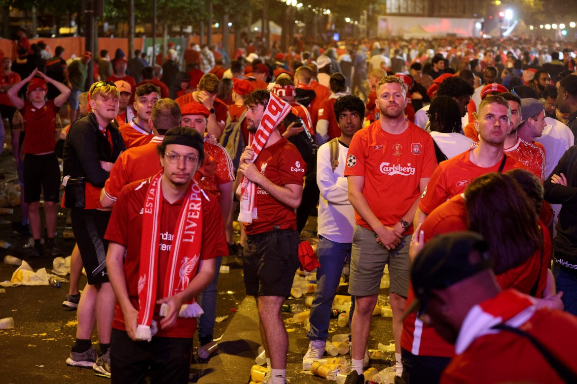 Liverpool fans look dejected as Real Madrid win the Champions League Final