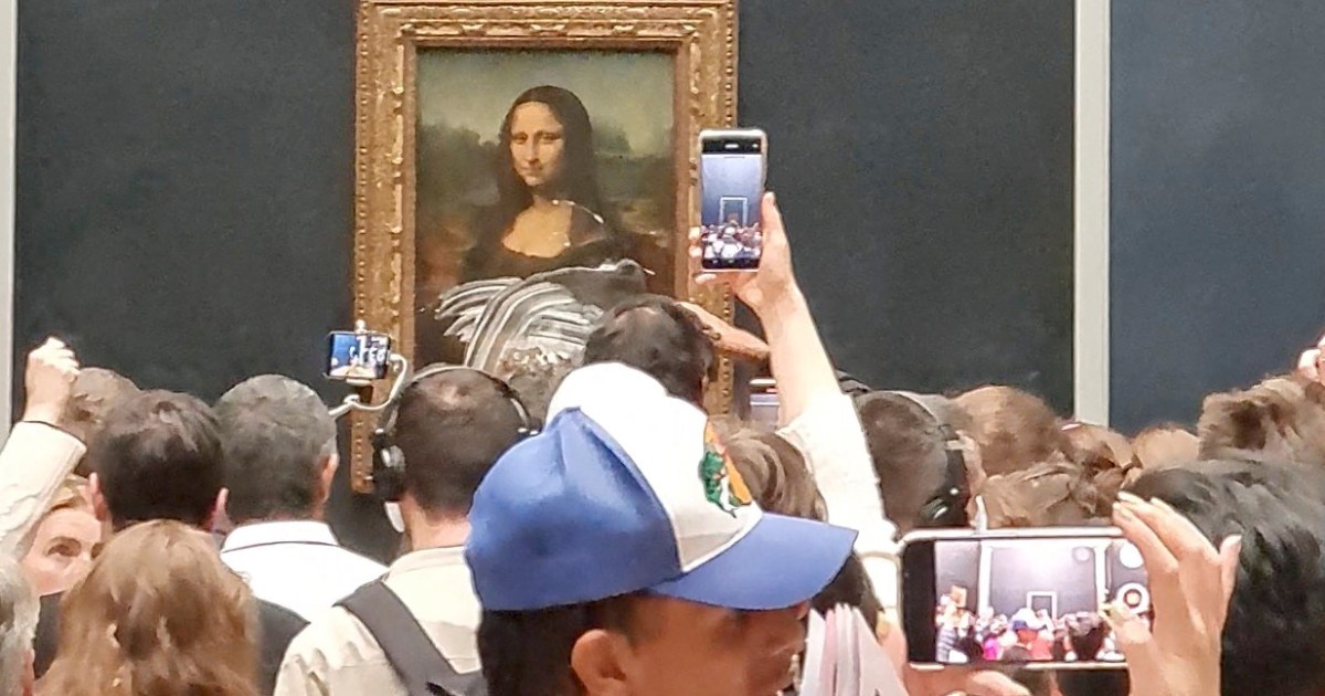 Verdachte aangehouden na insmeren Mona Lisa met slagroomtaart  Nieuws over kunst en cultuur