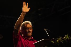 Gotabaya Rajapaksa waving at a podium