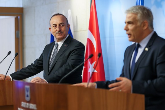 Turkish Foreign Minister Mevlut CaTurkish Foreign Minister Mevlut Cavusoglu (L) and Israeli Foreign Minister Yair Lapid (R) hold a joint press conferencevusoglu in Jerusalem