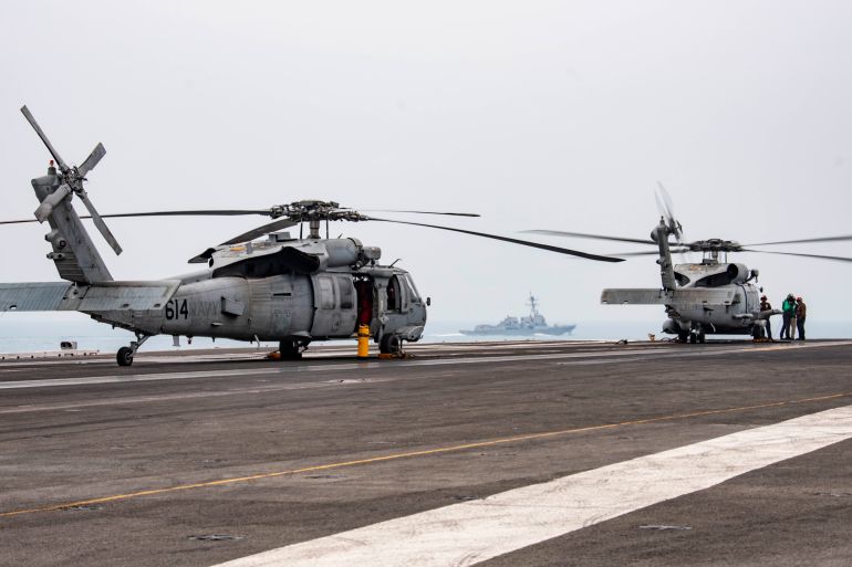 MH-60R anti-submarine helicopters on the flight deck of the USS Ronald Reagan