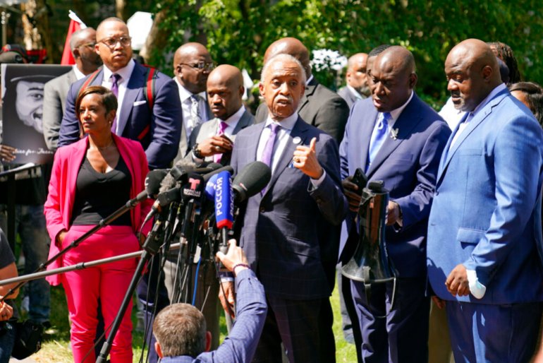 The Rev. Al Sharpton, center, address a news conference with attorneys and George Floyd family members after former Minneapolis police officer Derek Chauvin was sentenced to 22 1/2 years in prison.
