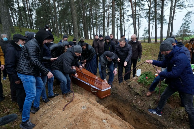 A local Muslim community buried a Yemeni migrant Mustafa Mohammed Murshed Al-Raimi, in Bohoniki, Poland, Sunday, Nov. 21, 2021.